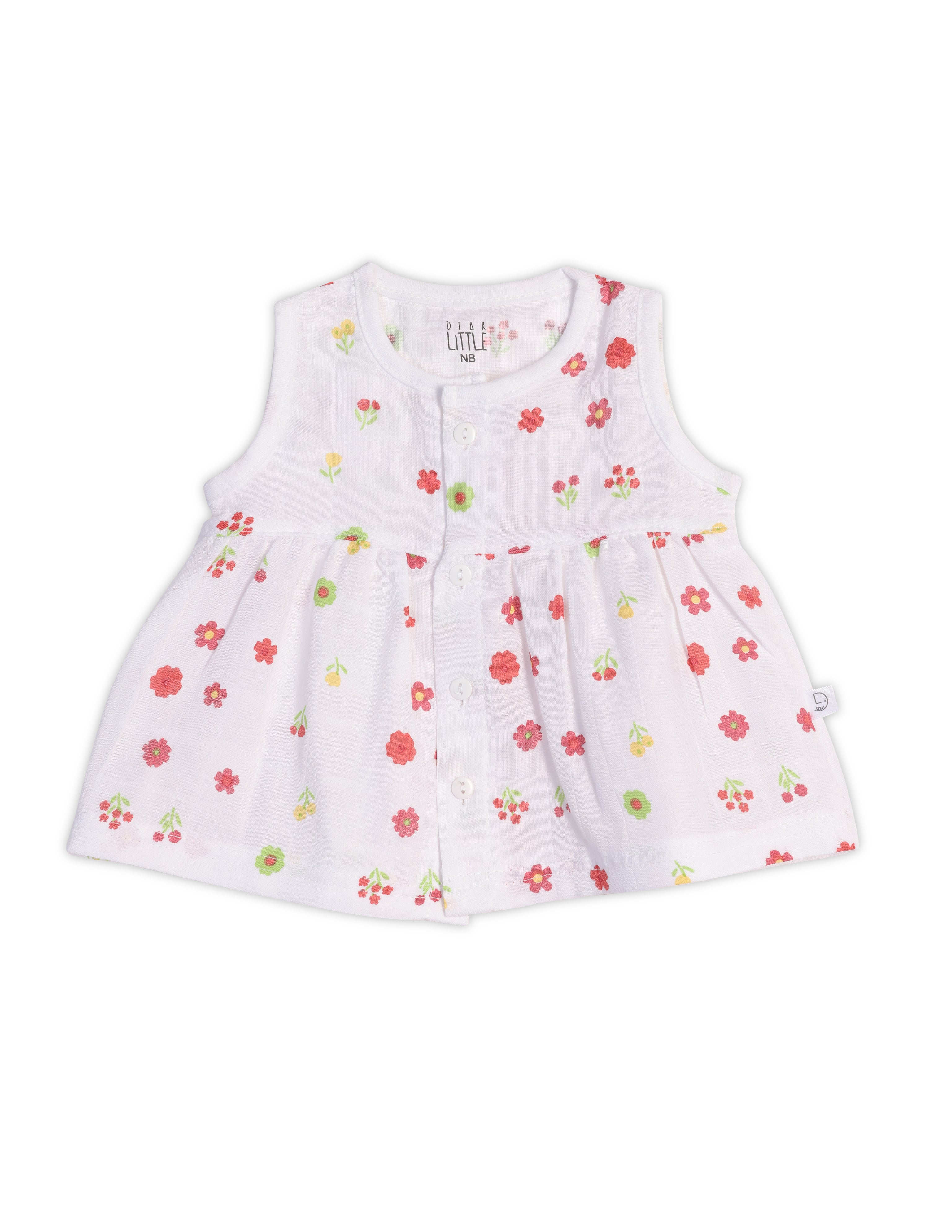A sleeveless white baby frock with a floral pattern, displayed against a plain background.