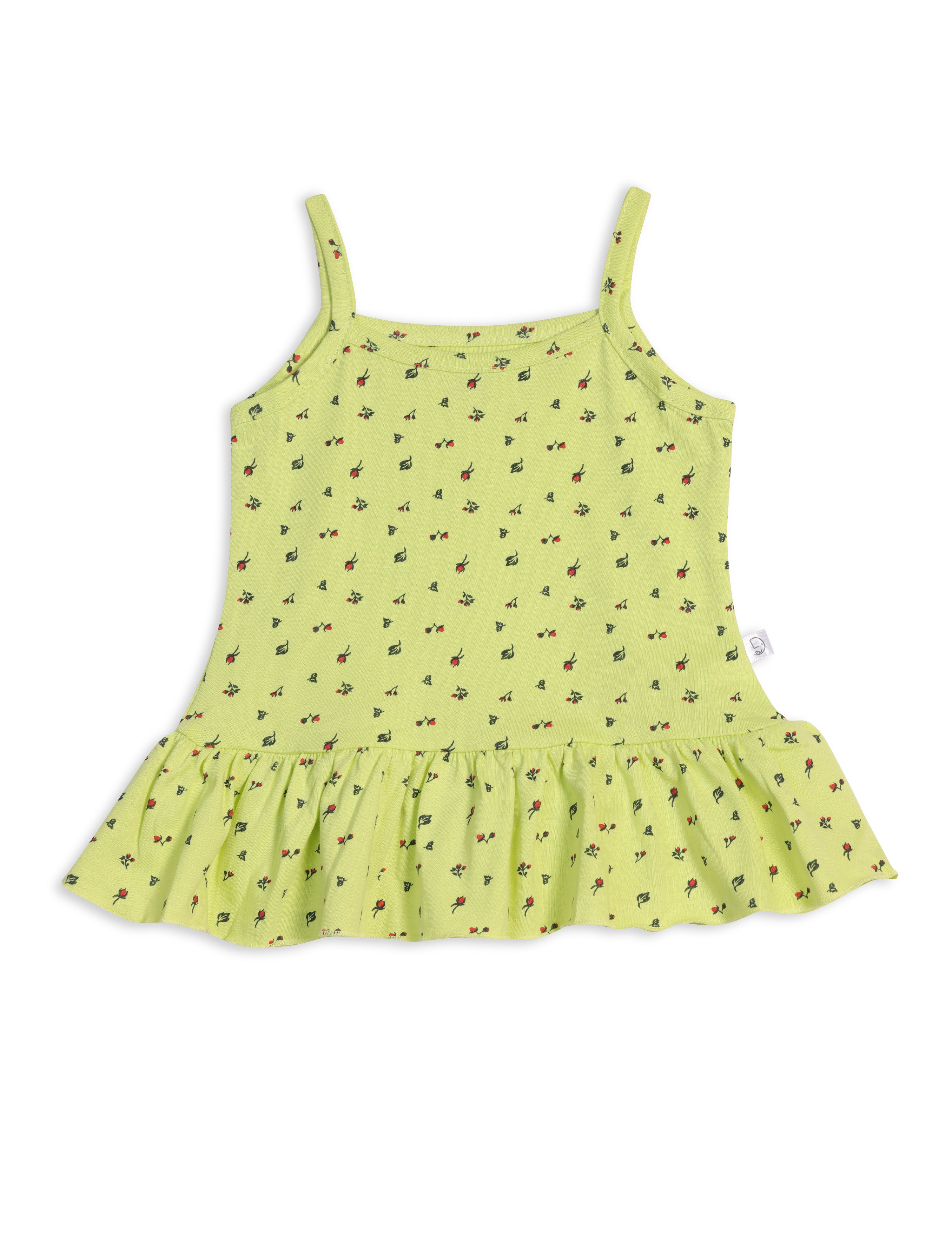 A green spaghetti strap top with a floral pattern and frill detailing at the hem.