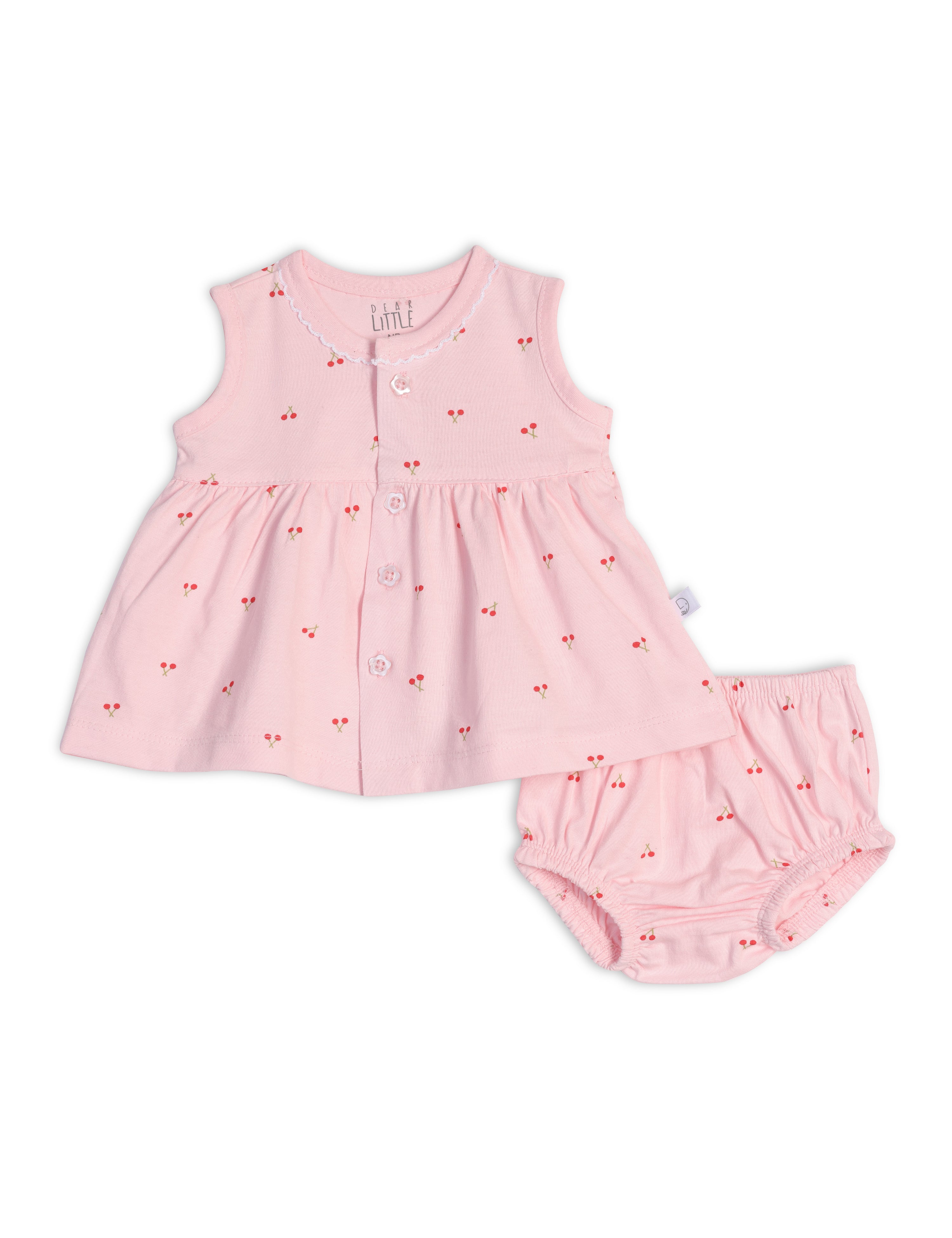 A sleeveless pink cotton frock with cherry blossom prints paired with a matching bloomer for babies.