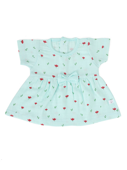 Green half sleeve muslin bow frock with a floral pattern and a front bow.
