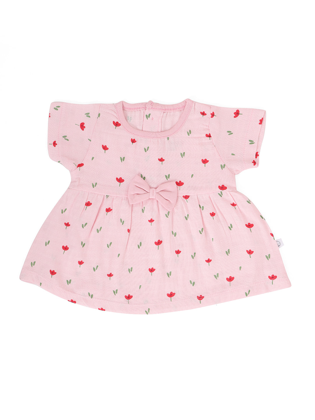 A short-sleeved pink muslin bow frock with a floral pattern and a front bow detail.
