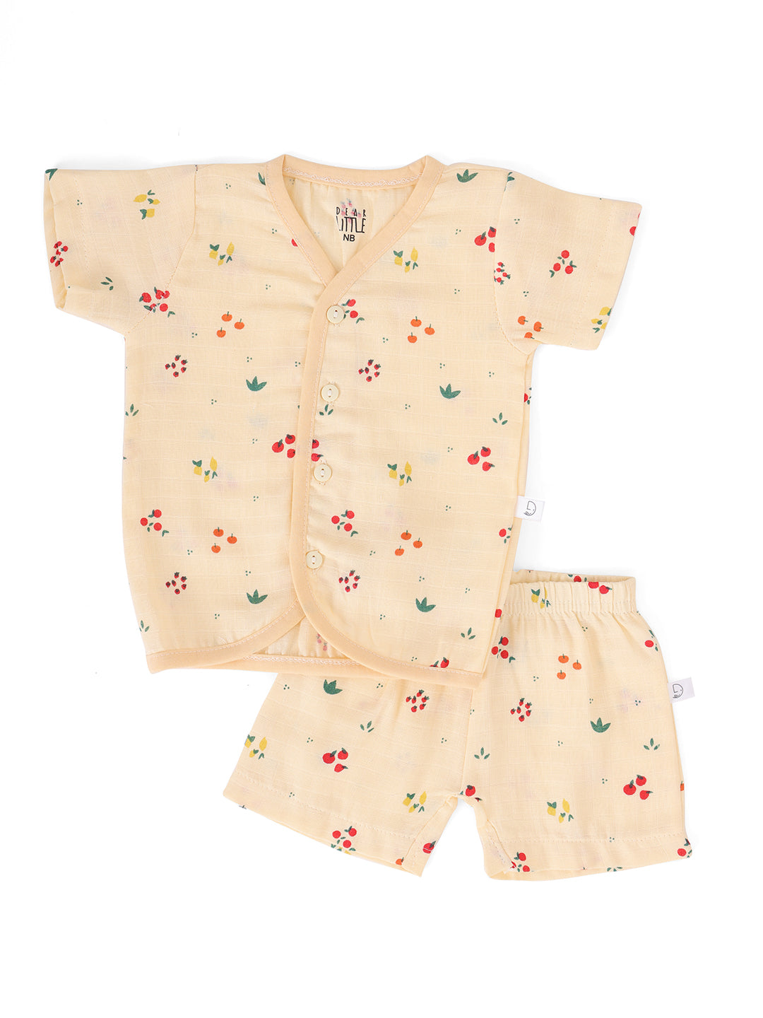 A cream-colored muslin half sleeve jhabla and shorts set for babies, with a floral pattern.