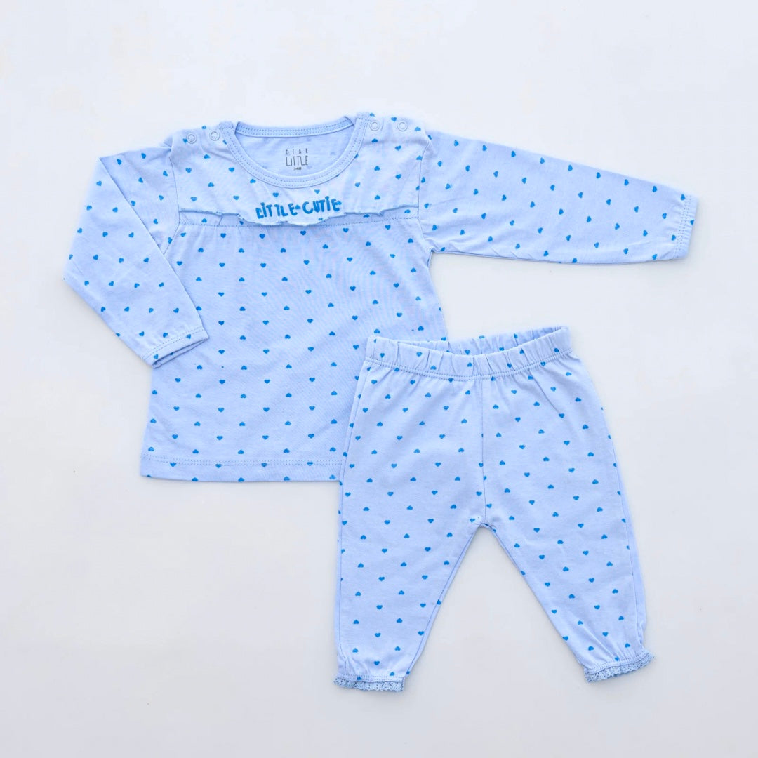 A baby co-ord set with blue color, consisting of a long-sleeve top with heart and animal print and matching leggings, displayed on a white background.