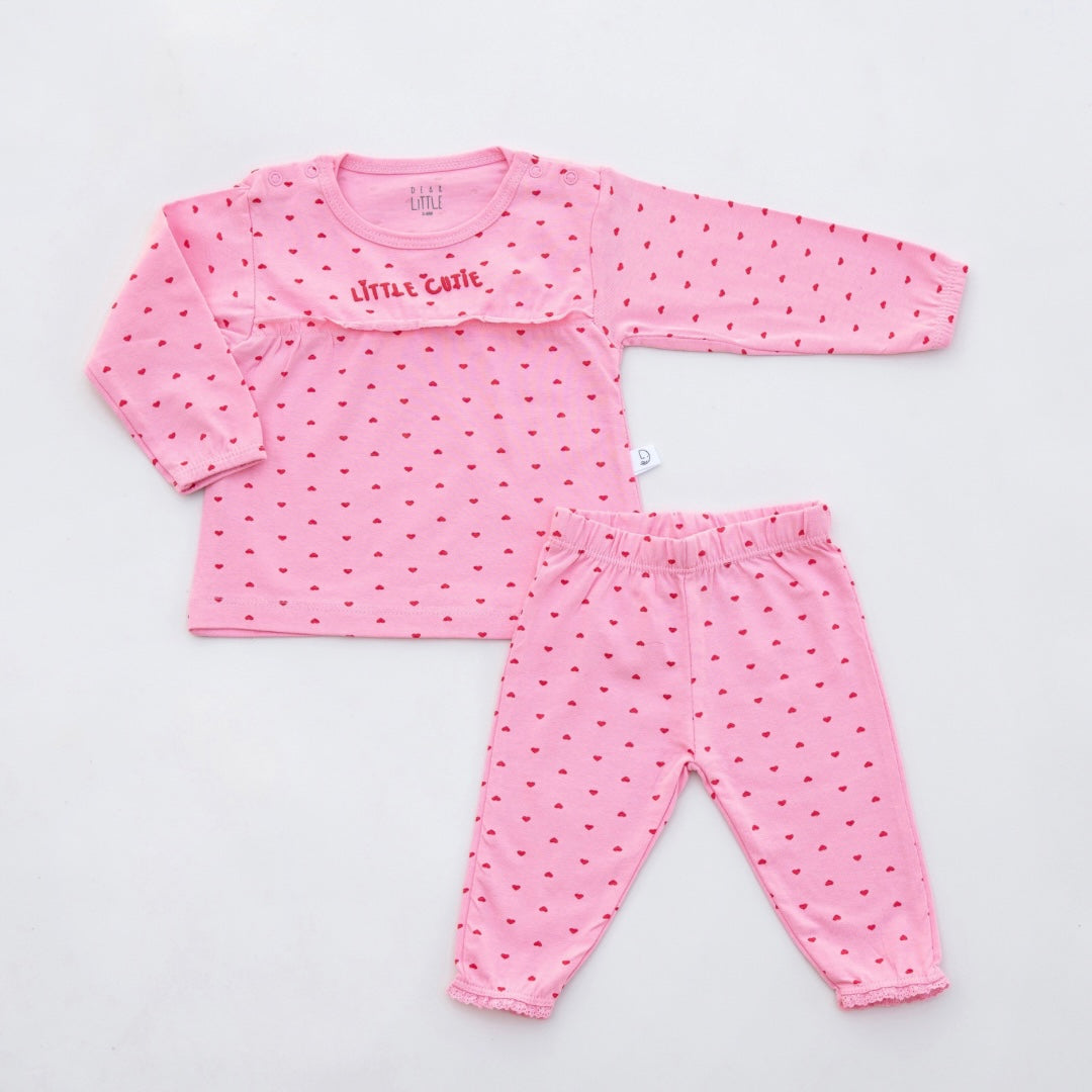 A pink long-sleeve top and matching leggings set for babies, with heart patterns and lace trim.
