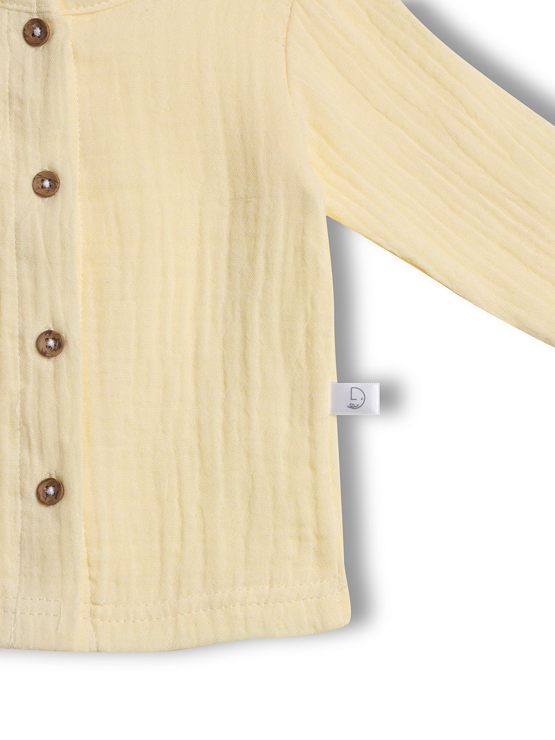 Beige ribbed sweater with brown buttons 