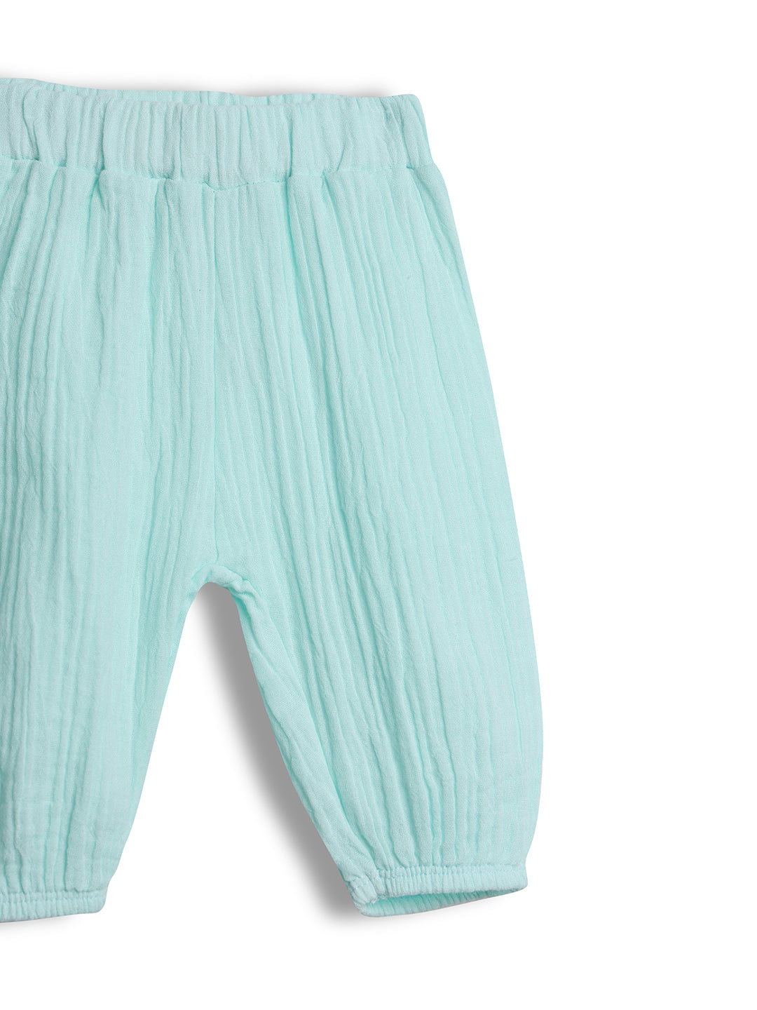 Light blue baby pants on a white background