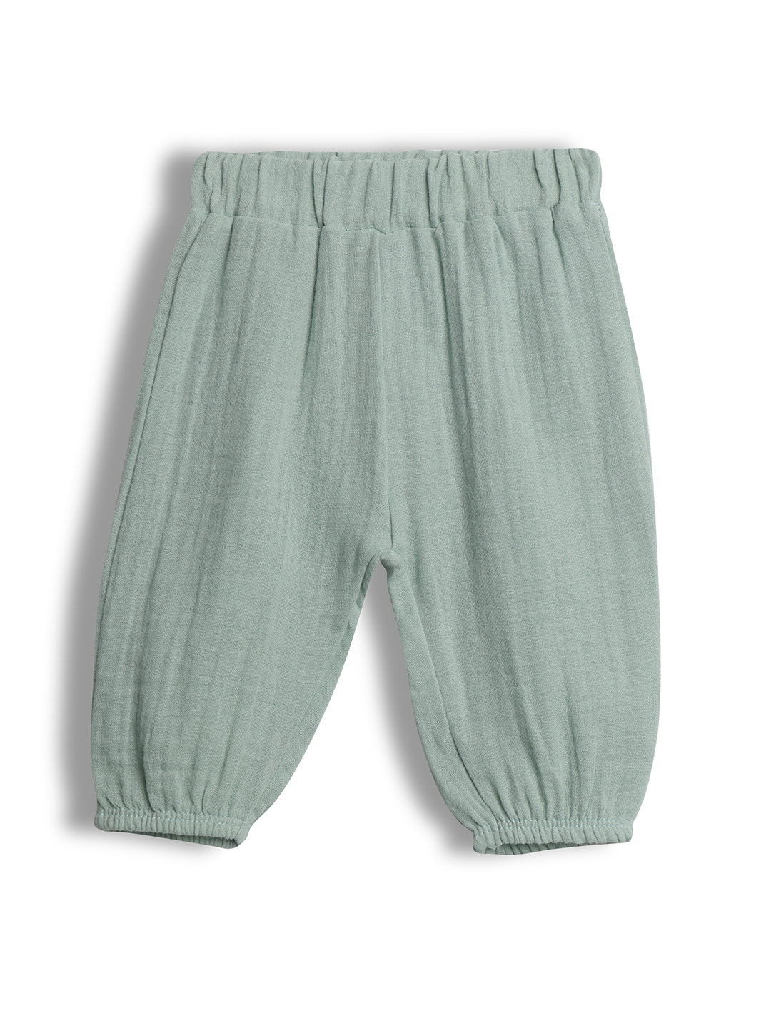 Light green baby pants on a white background