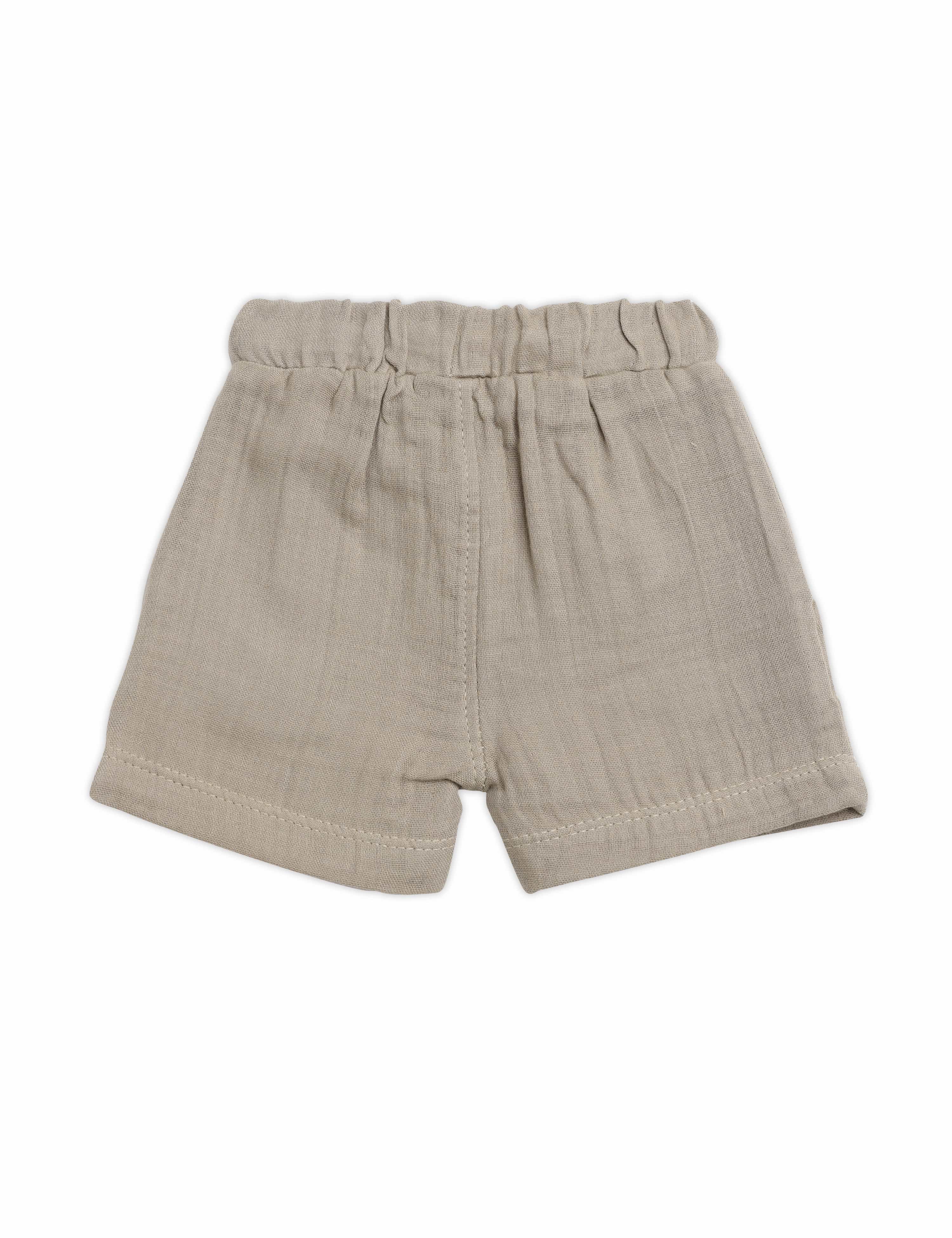 Beige shorts on a white background