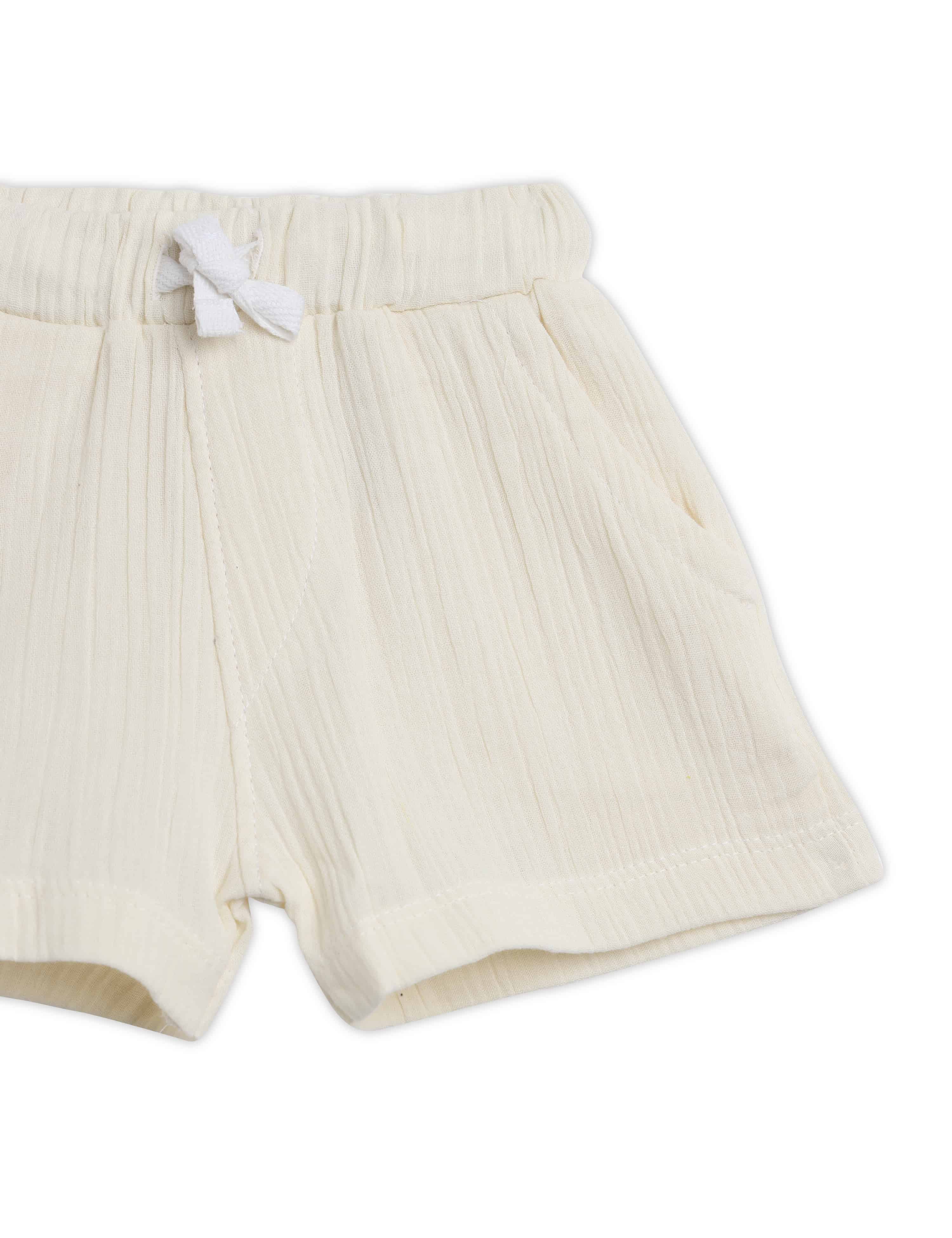 Beige shorts with a white drawstring on a white background