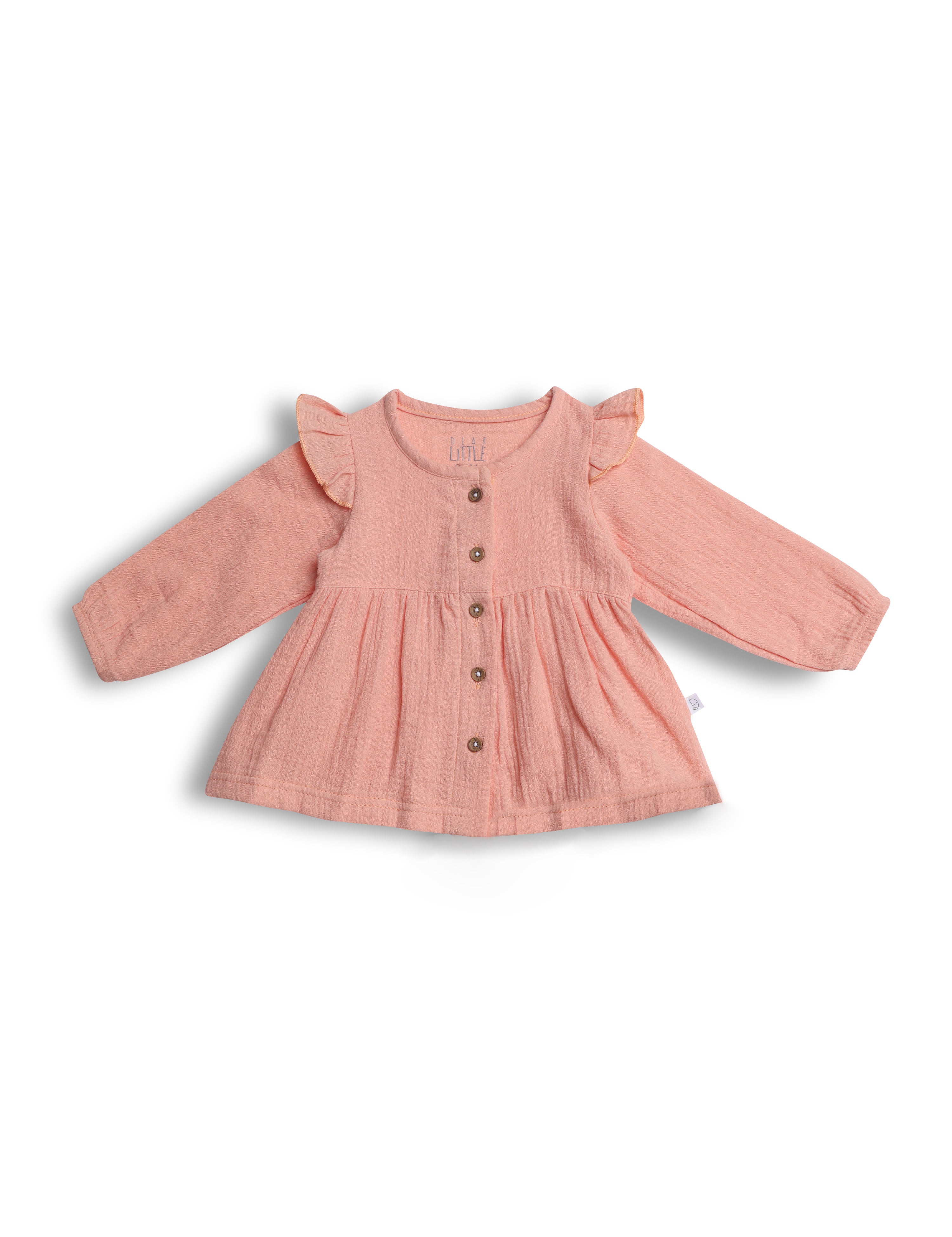 Pink baby dress with ruffled sleeves on a white background