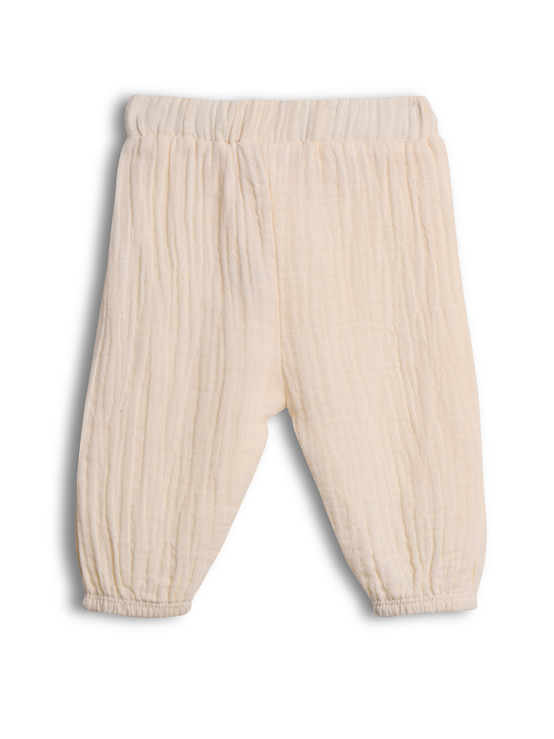 Beige ribbed baby pants on a white background