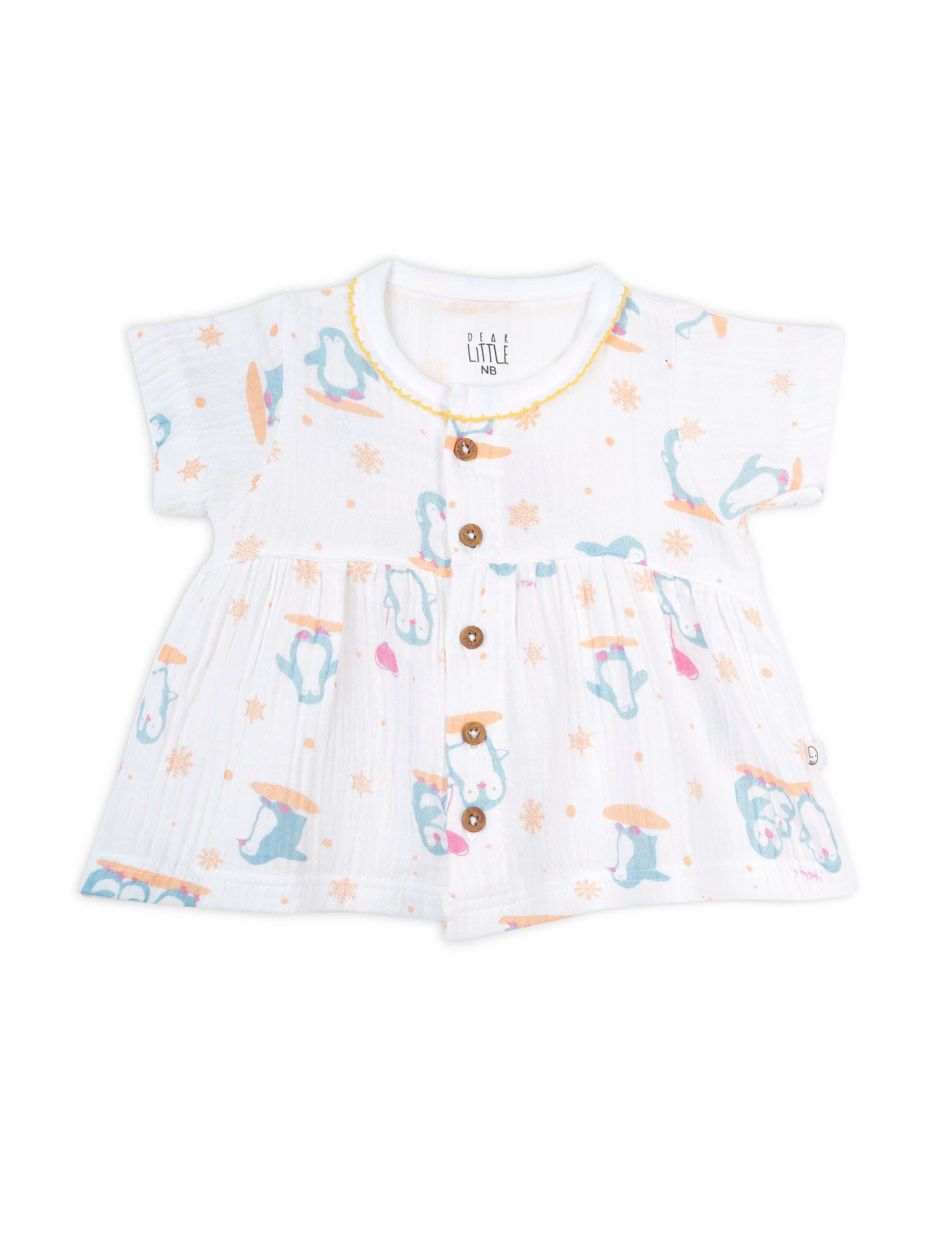 A short-sleeved baby frock with blue and yellow penguin patterns, buttoned down the front, and a flowy silhouette.